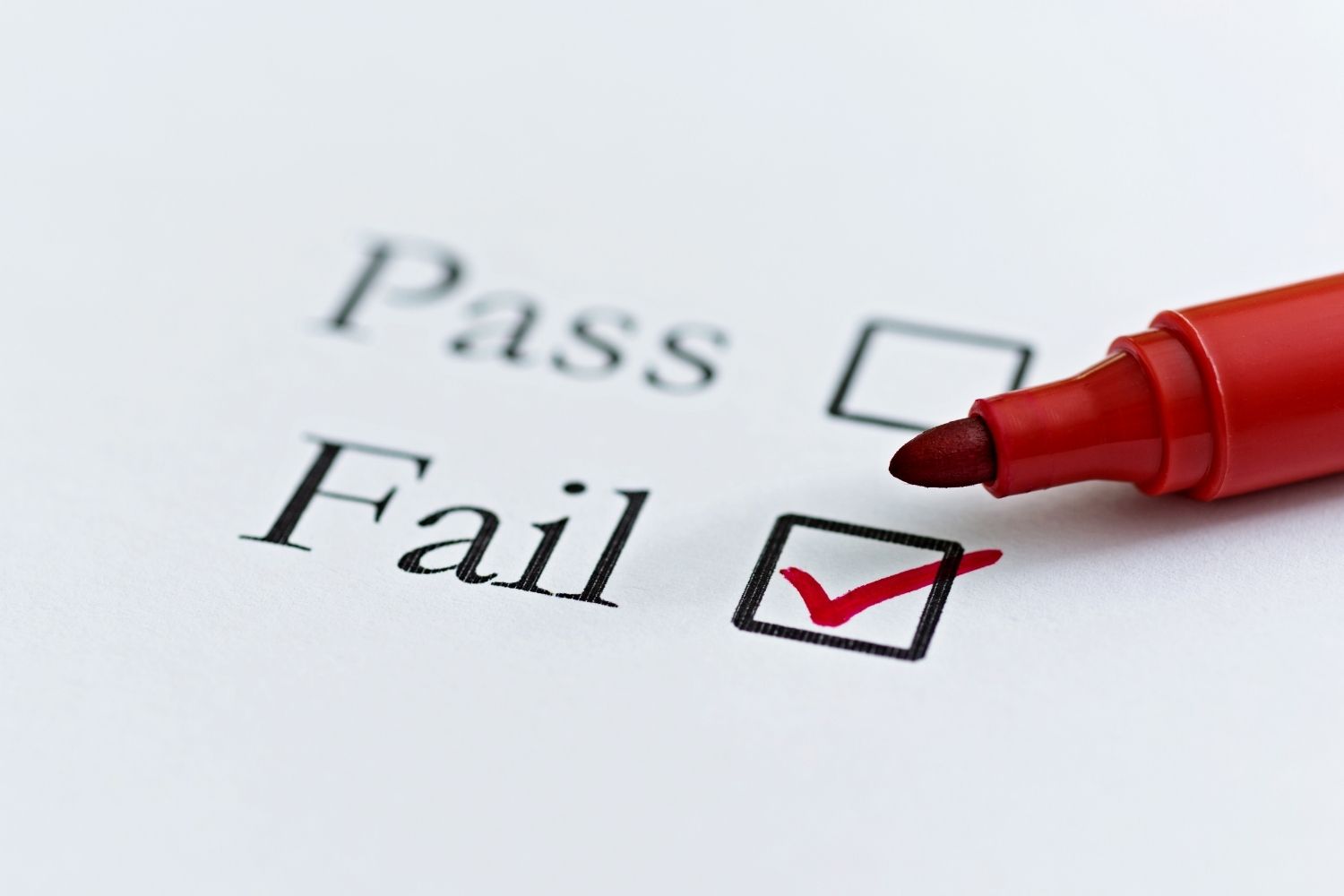 A form that reads Pass or Fail with the Fail box Marked with a Red Checkmark